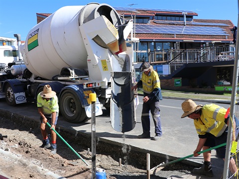 Council staff pouring concrete