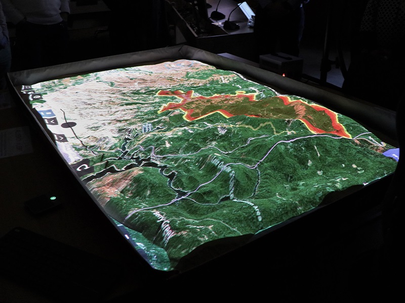 The SimTable in action showing the spread of a fire front through the hinterland of the Ku-rin-gai area. SimTable-Demo-Fires 800px.jpg