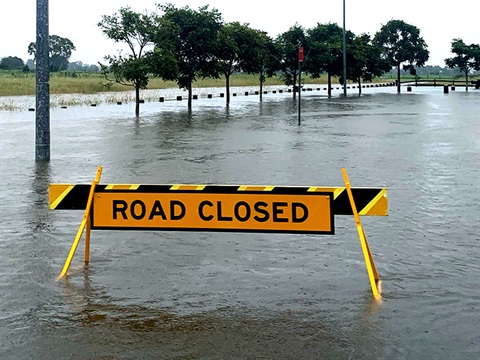 Road Closed sign in flood